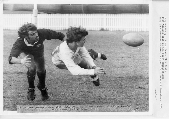 McCoy Can Fly:    “SPORTS SHOT OF THE YEAR” Finalist 1975:                           ST GEORGE five-eight Doug McCoy takes off to beat Randwick winger Jeff Ellis.